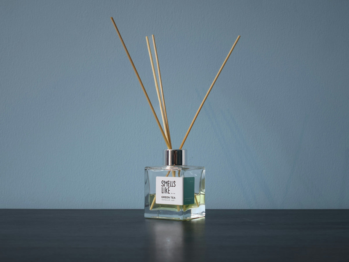 Alcohol-free French reed diffuser with natural reeds in a home setting