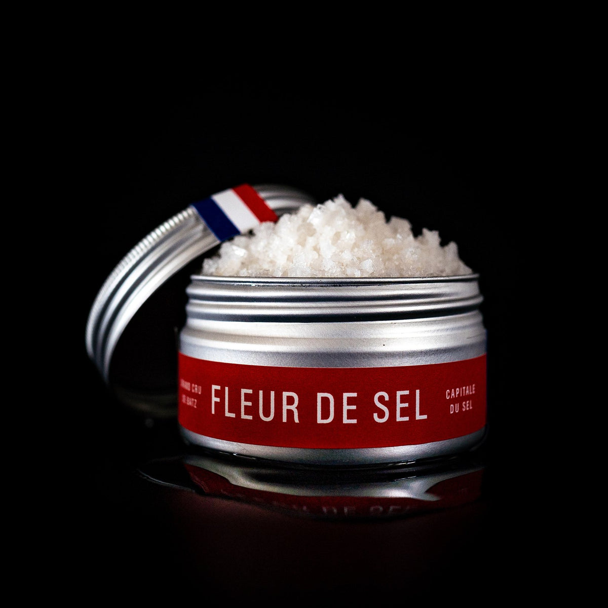 Binet 1660 fleur de sel tin from Batz-sur-Mer on a black background