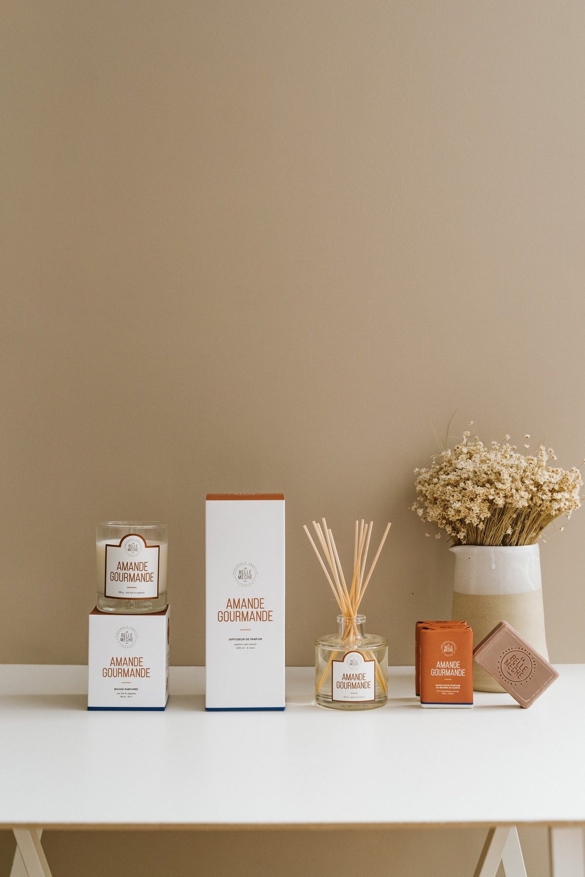 French Sweets Candle by La Belle Mèche on its box, with the matching diffuser and soaps