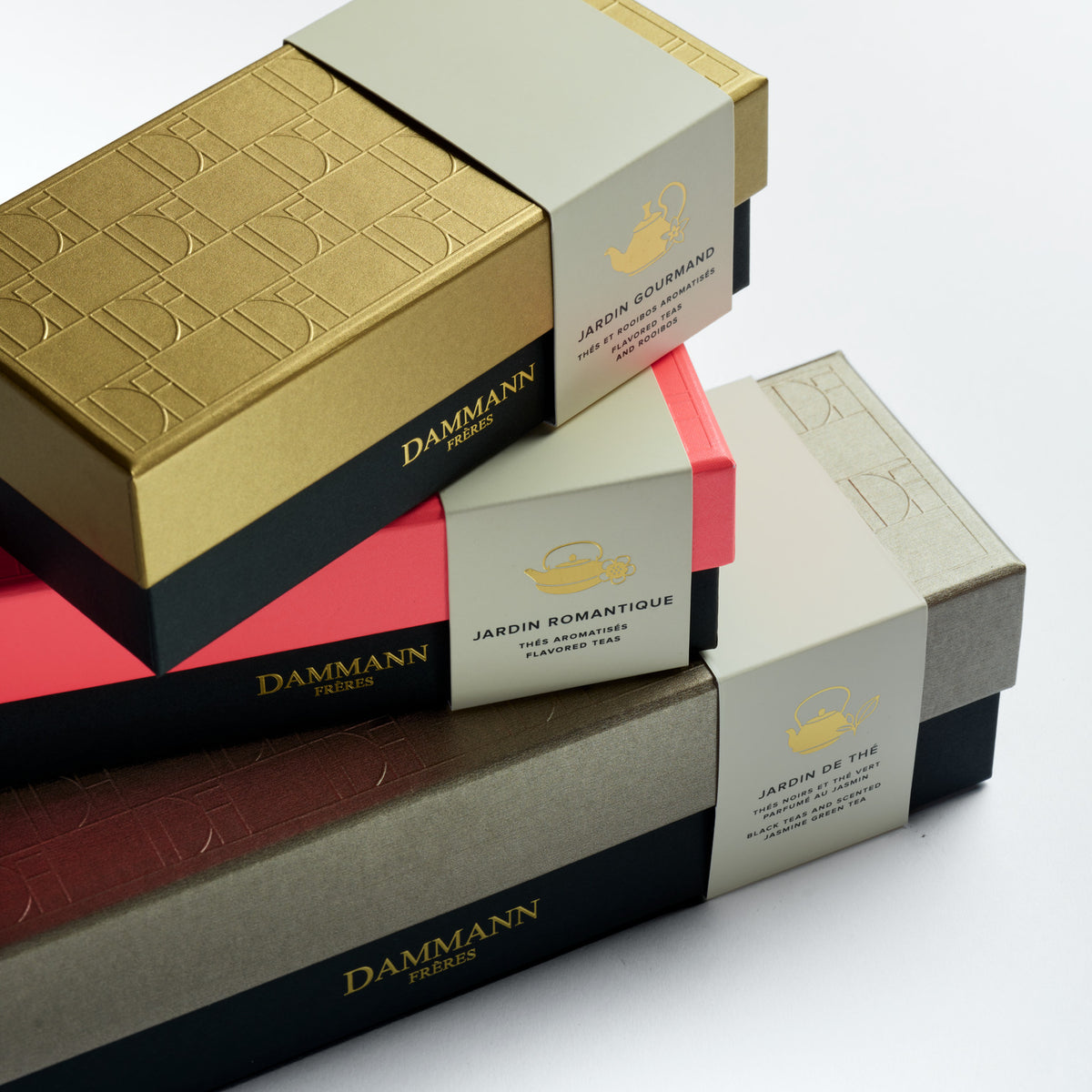 Dammann Frères Jardin gift boxes stacked, including the Jardin Gourmand Gift Set