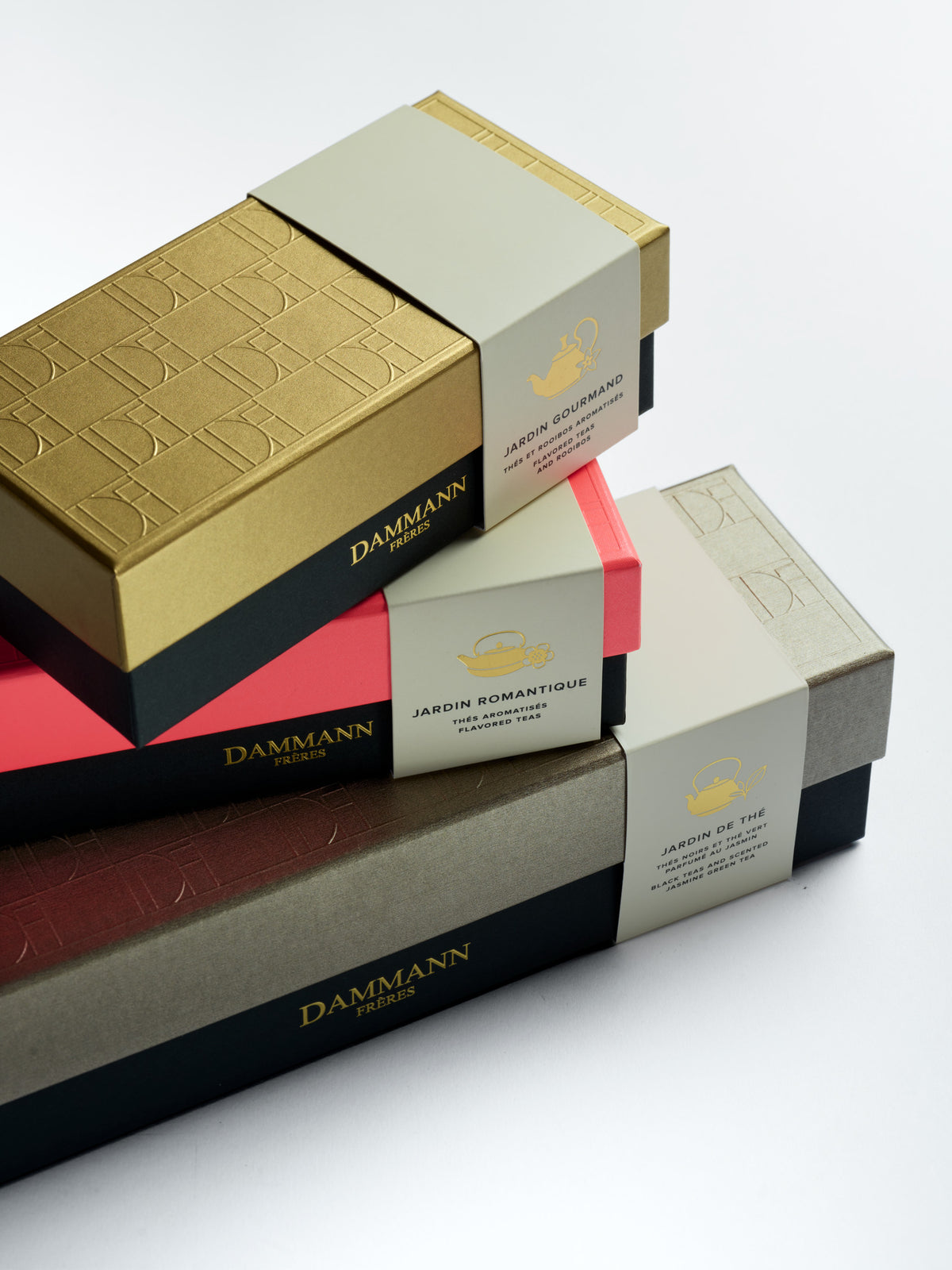 Dammann Frères Jardin gift boxes stacked, including the Jardin Gourmand Gift Set