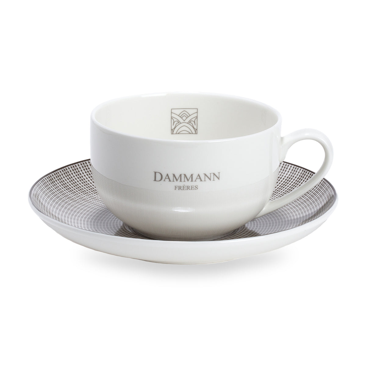 Tasse et sous-tasse de Dammann Frères, porcelaine blanche et soucoupe à motif