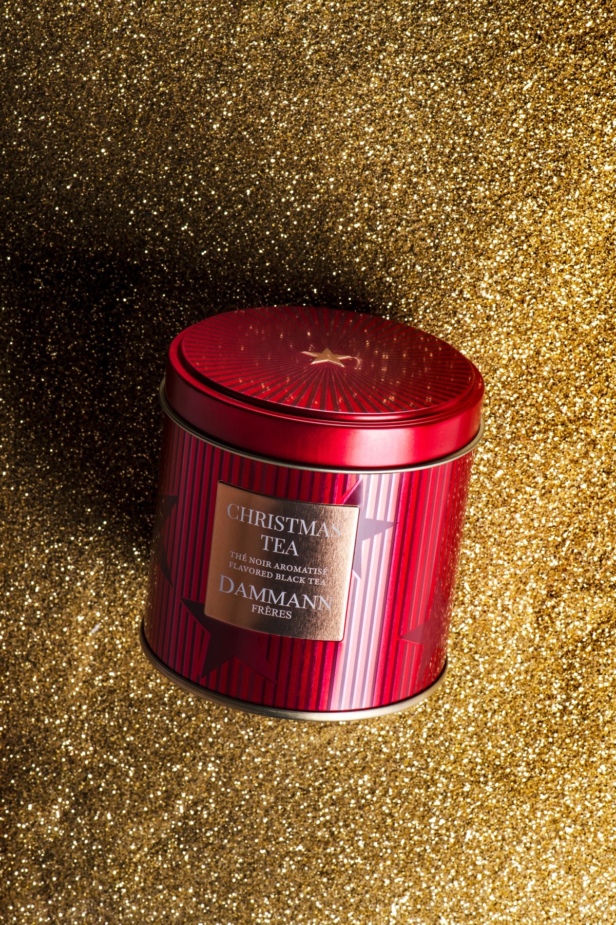 Christmas Tea canister by Dammann Frères, red striped tin on gold glitter