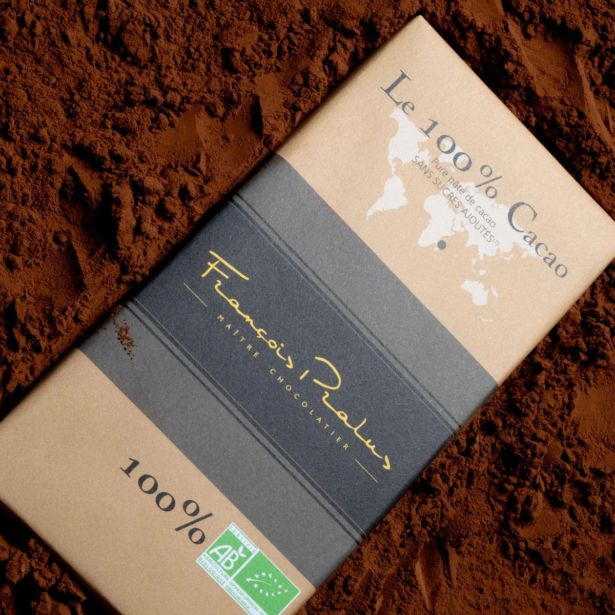 Madagascar 100% Dark Chocolate Bar by François Pralus on cocoa powder