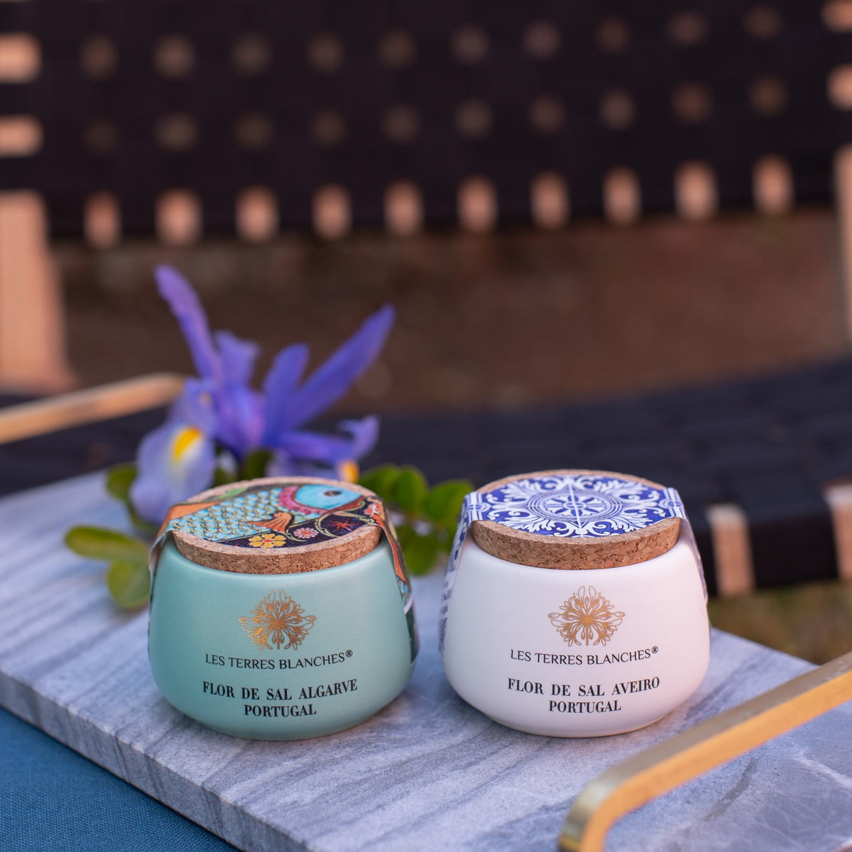 Fleur de Sel Aveiro by Les Terres Blanches, ceramic jar beside a jar of Algarve fleur de sel on a marble tray