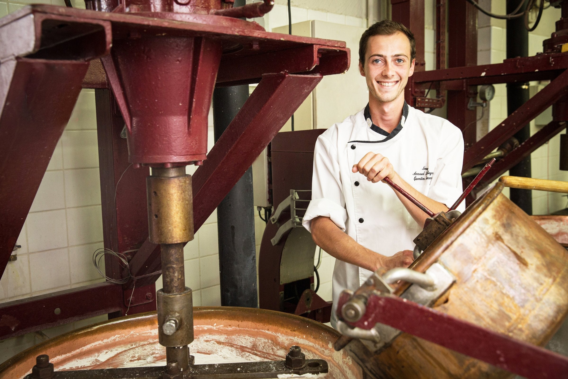 Arnaud Soubeyran confectioner at a copper nougat cauldron in Montélimar