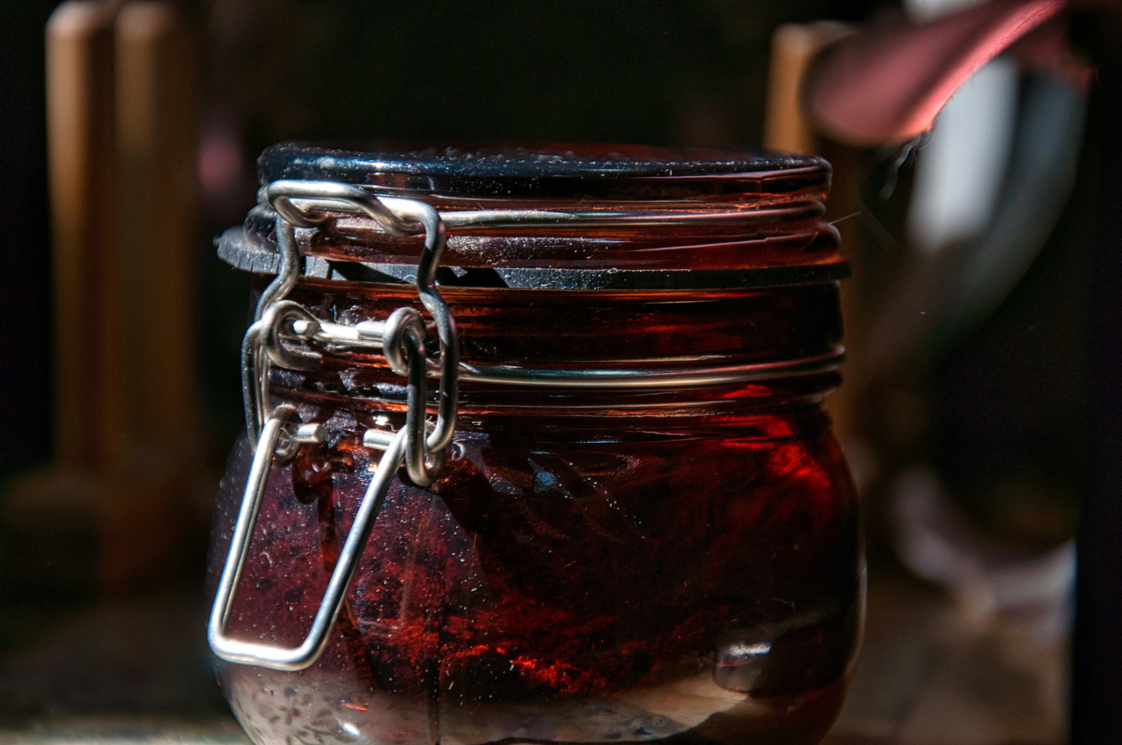 Jars of French artisan jam on a breakfast table
