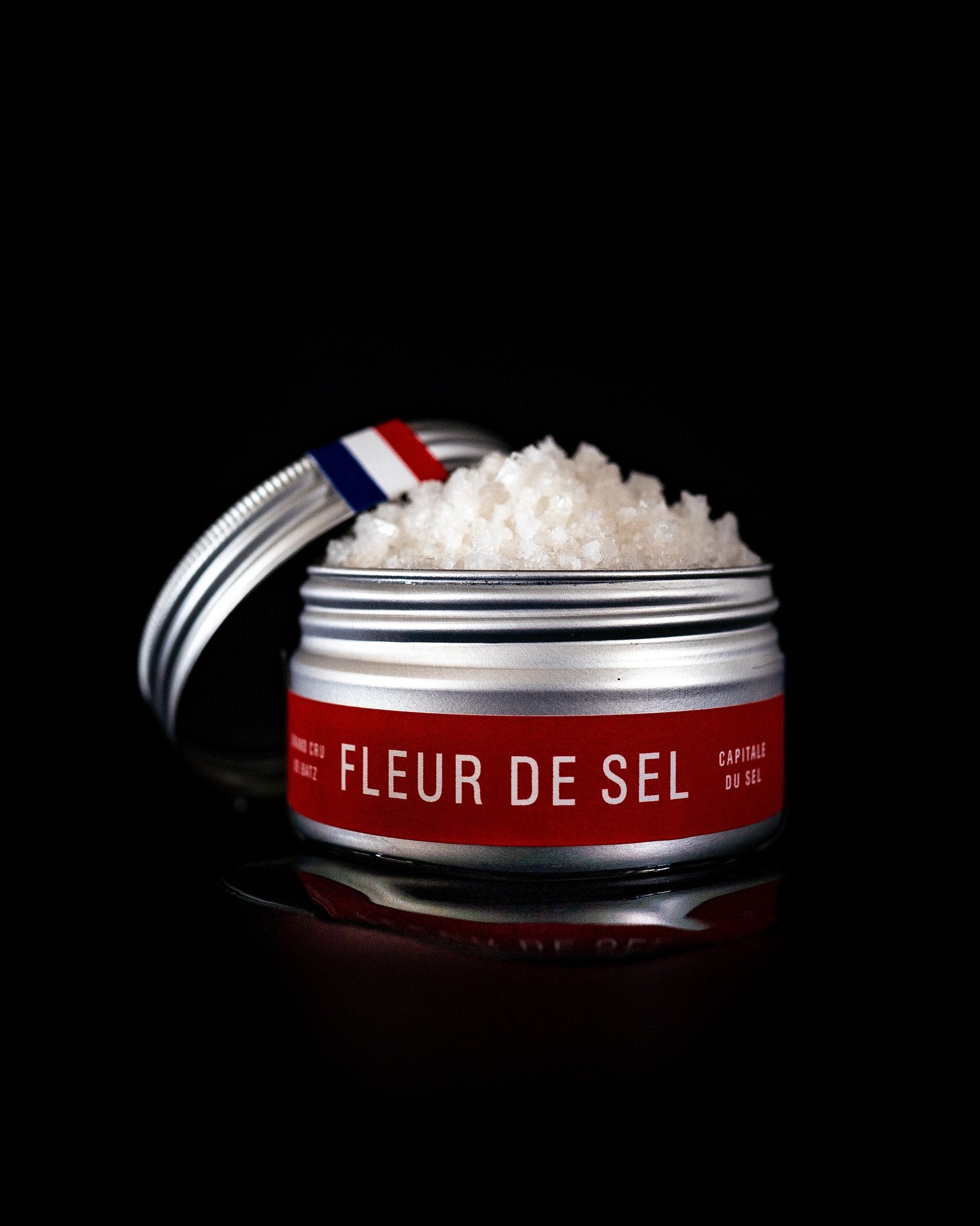 Binet 1660 fleur de sel tin from Batz-sur-Mer on a black background
