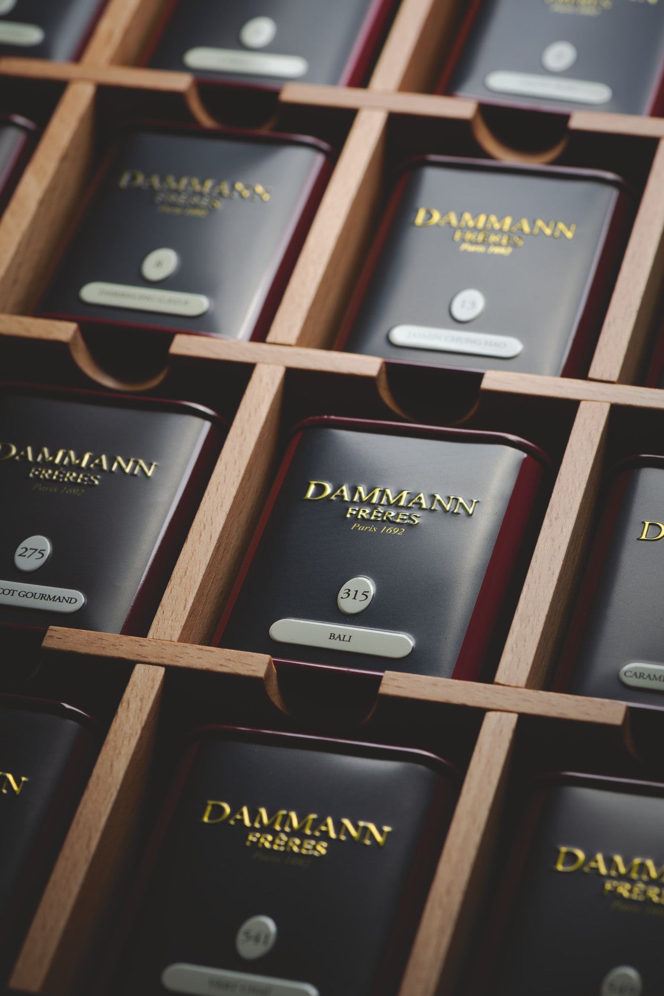 My Little Boutique by Dammann Frères, close-up of the mini tins in their wooden compartments