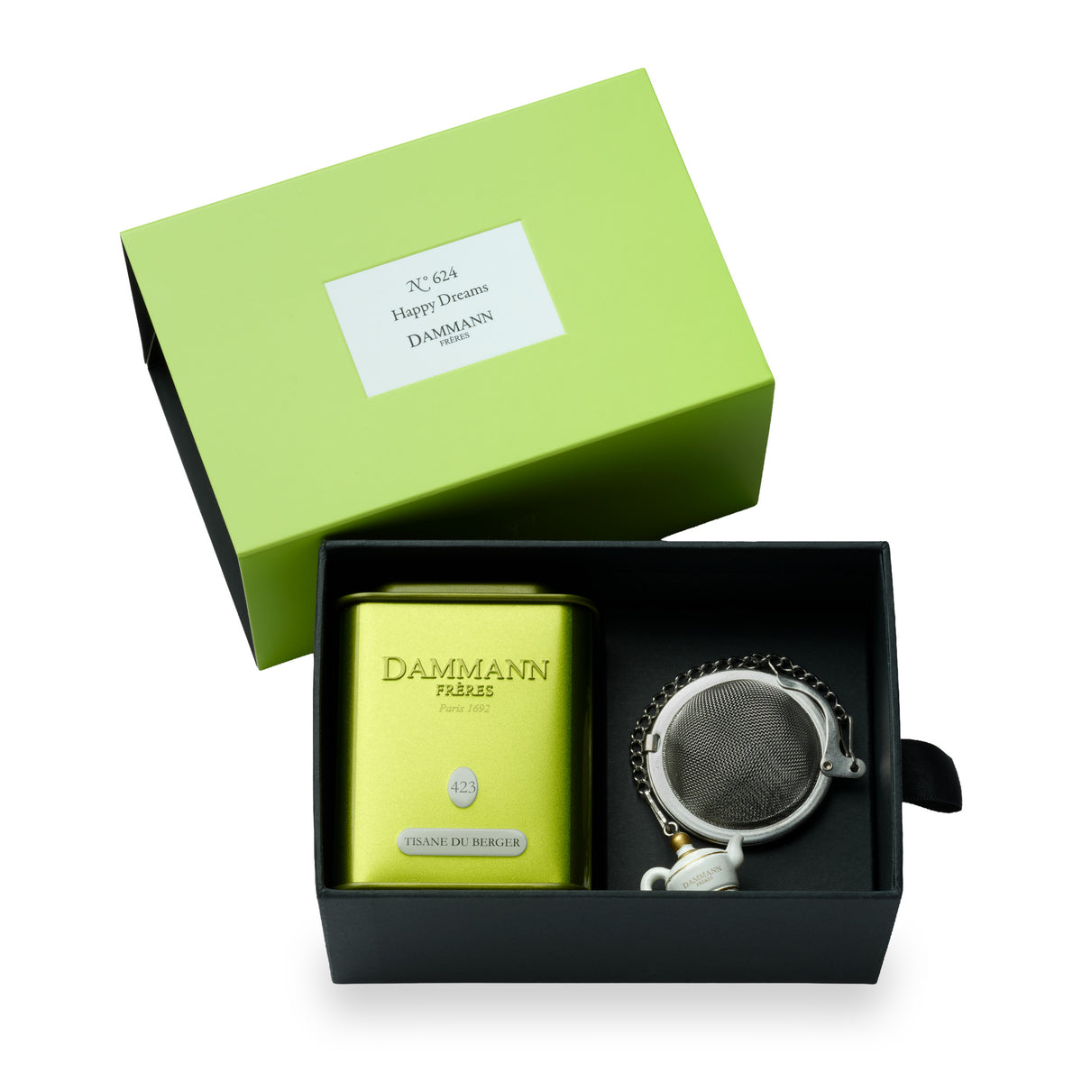 N°624 Happy Dreams gift box by Dammann Frères, open with a tea tin and a tea ball infuser