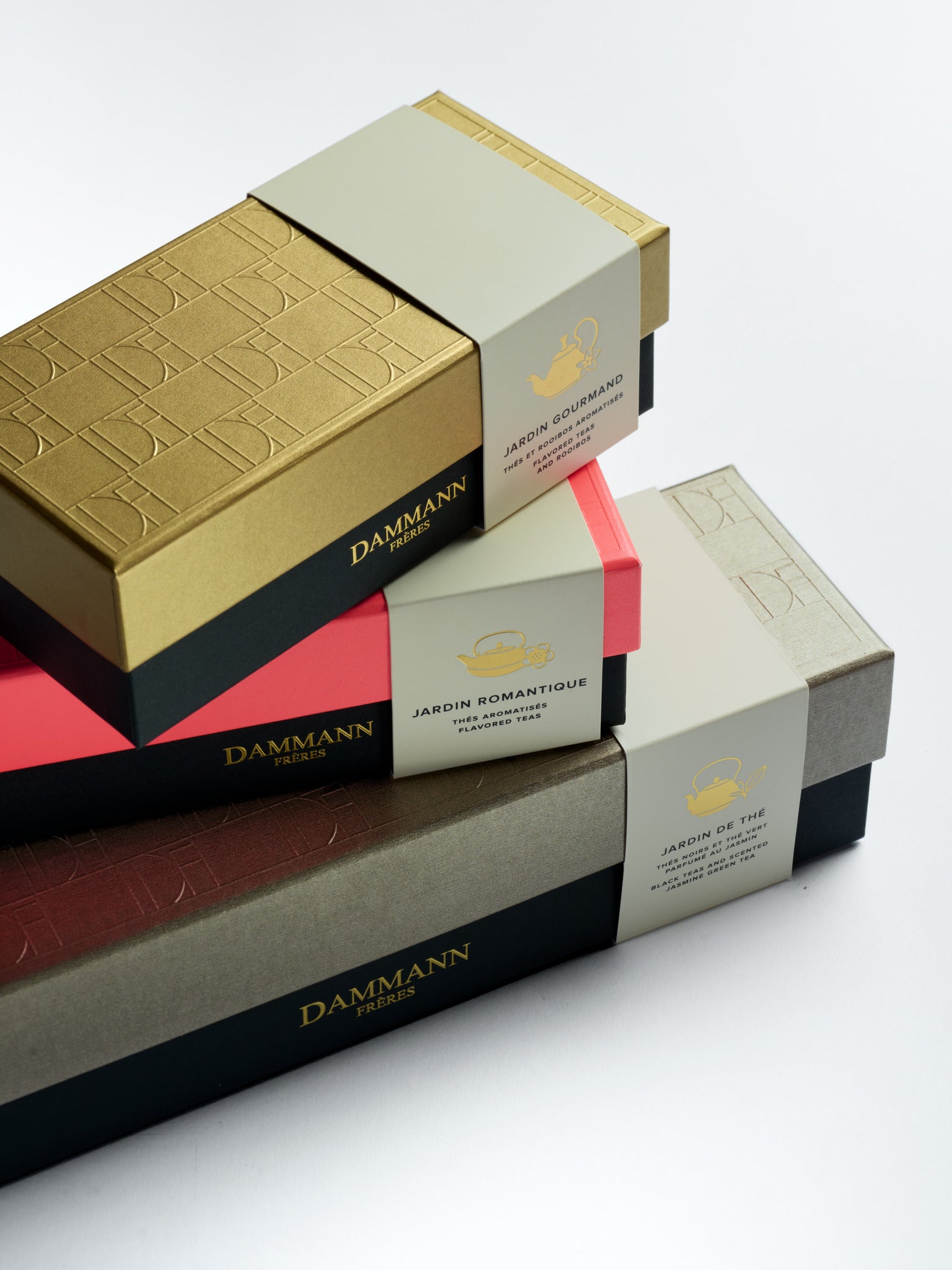 Dammann Frères Jardin gift boxes stacked, including the Jardin Gourmand Gift Set