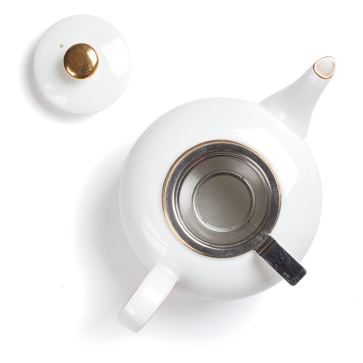 Théière en porcelaine Concorde de Dammann Frères, vue de dessus sans couvercle, filtre en inox visible
