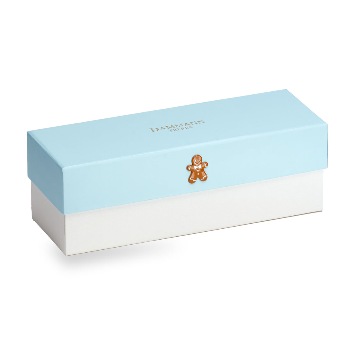 Coffret Noël Givré de Dammann Frères, boîte bleu pâle fermée ornée d’un médaillon bonhomme en pain d’épices