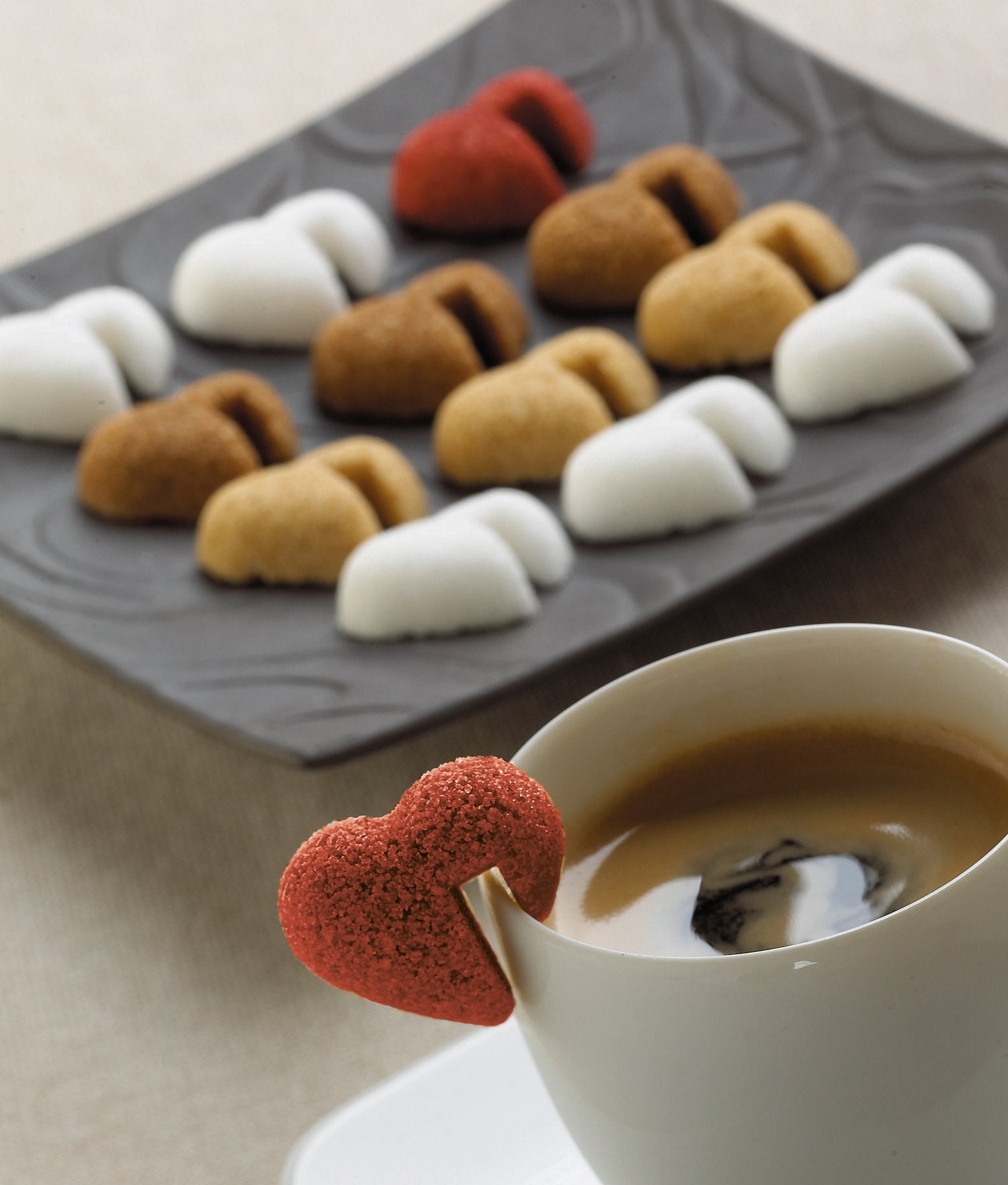 Canasuc red, white and amber heart sugars on a slate tray