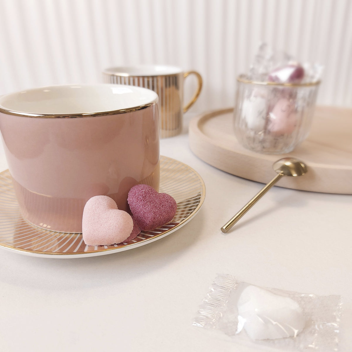 Canasuc pink and violet heart sugars with a teacup