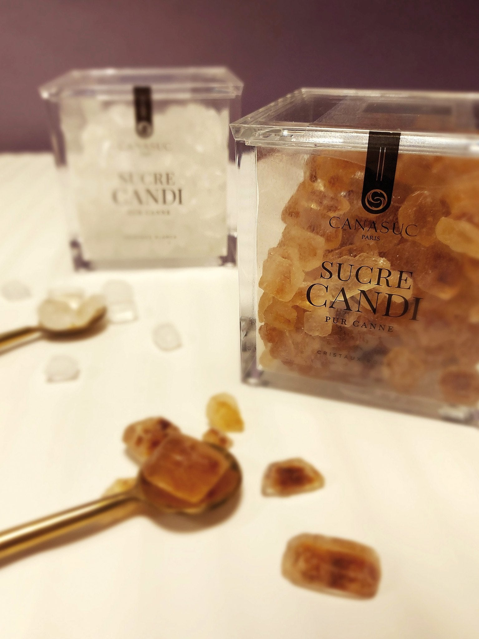 Canasuc brown candy sugar with its box and a gold spoon